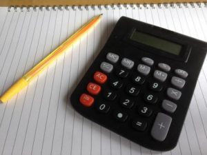 Picture of a calculator and a pencil