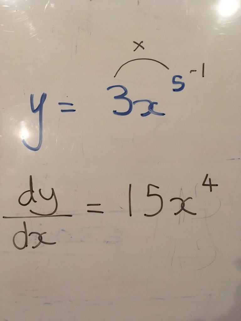 Image of a differentiation question written out on a whiteboard